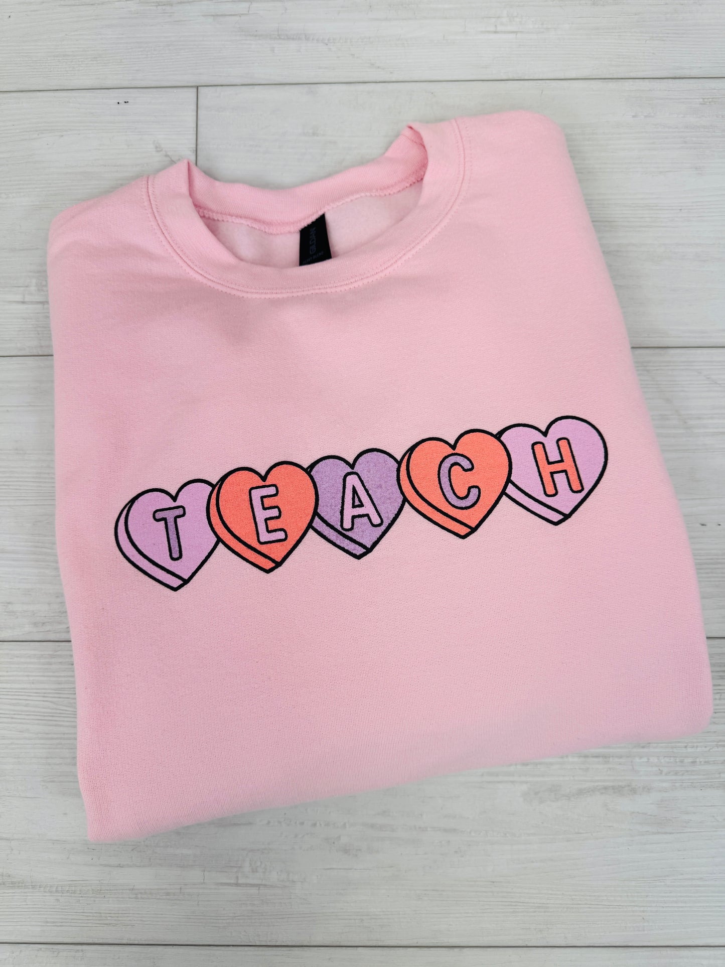 Teach Candy Hearts Graphic Crewneck Sweatshirt