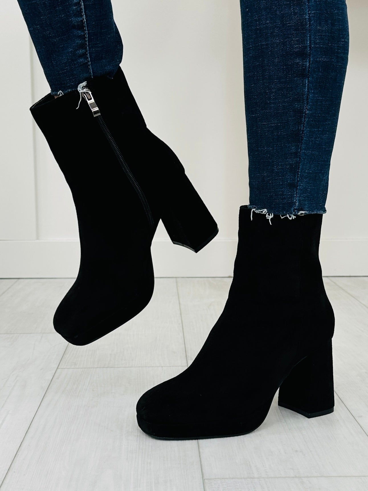 Stomp To The Rhythm Booties In Black Suede