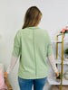 A Story in Every Seam Top In Sage
