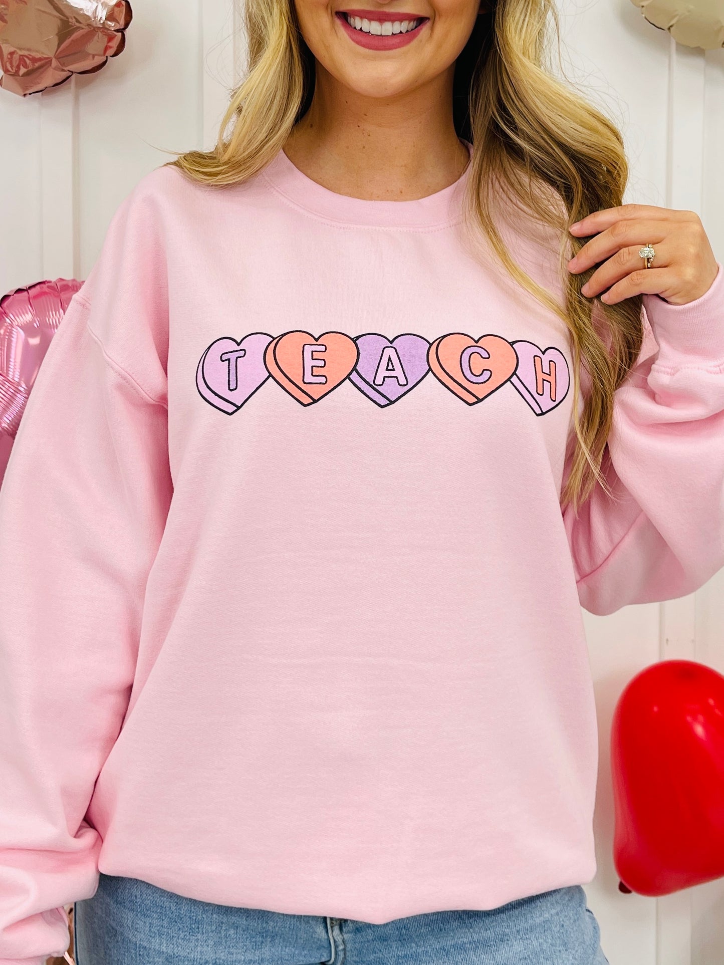 Teach Candy Hearts Graphic Crewneck Sweatshirt