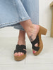 The Cross Over Heeled Mules In Black
